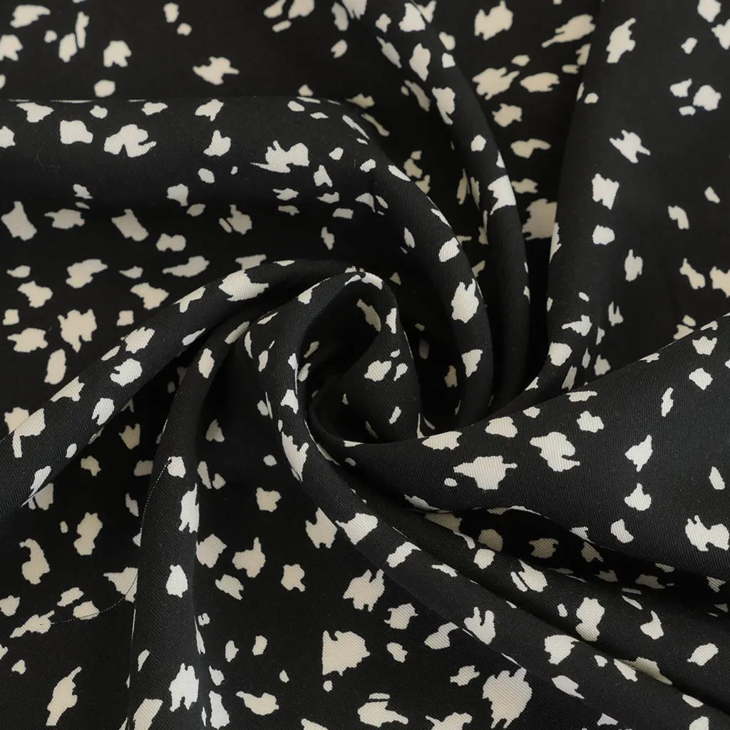 Linz- Black Animal Elements Viscose Woven Twill Fabric