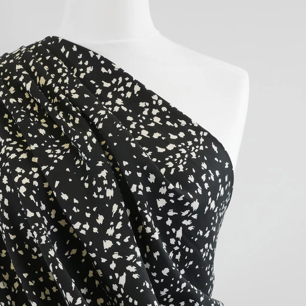 Linz- Black Animal Elements Viscose Woven Twill Fabric